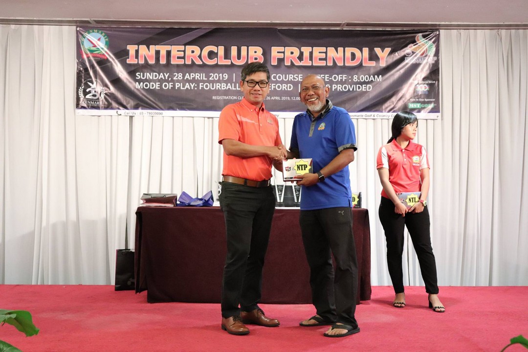 Interclub Friendly Match Winner getting awarded at Glenmarie Hotel & Golf Resort Malaysia