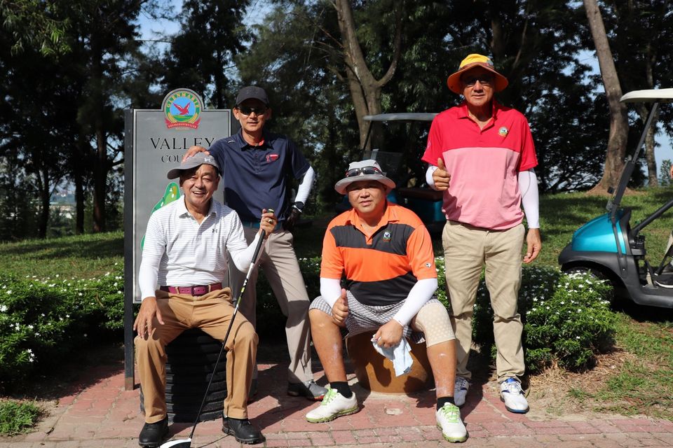 Four guests pose for a photo at Glenmarie golf course