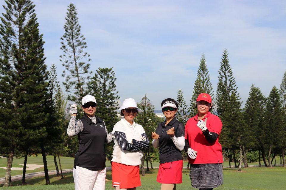 Three female golfers enjoying a round