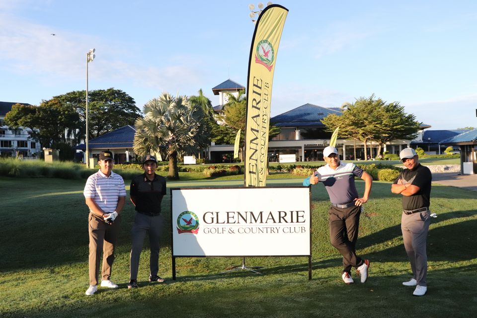 Four Gentlemen Standing in front of the Stunning Glenmarie Club